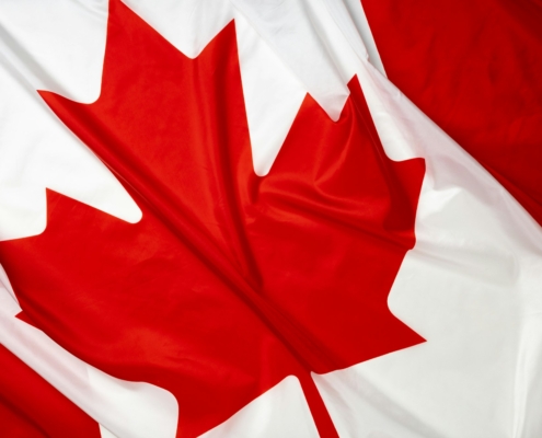 Rippled textile flag of Canada close up