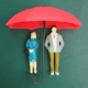 umbrella protects husband and wife. the concept of husband and wife protection. Homeowners spouses